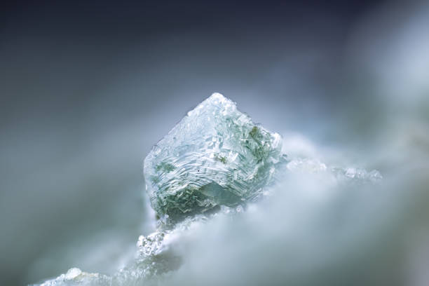 Prehnite crystal with epidote inclusion. Micro photography extreme close-up. microscope mineral crystal photography for Scientific use.