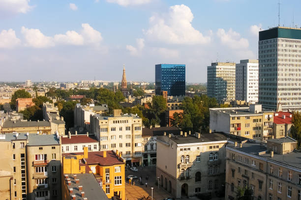 Lodz, Poland - September 27, 2005: A fragment of the city panorama shows some architectural details. We see a variety of buildings according to their purpose and architectural style.