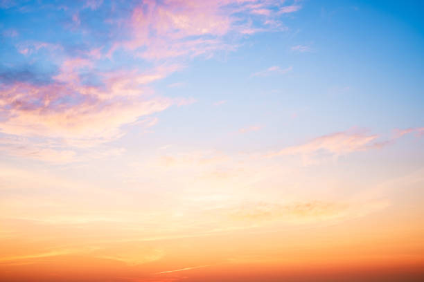 istock Beautiful , luxury soft gradient orange gold clouds and sunlight on the blue sky perfect for the background, take in everning,Twilight, Large size, high definition landscape photo 2164782654