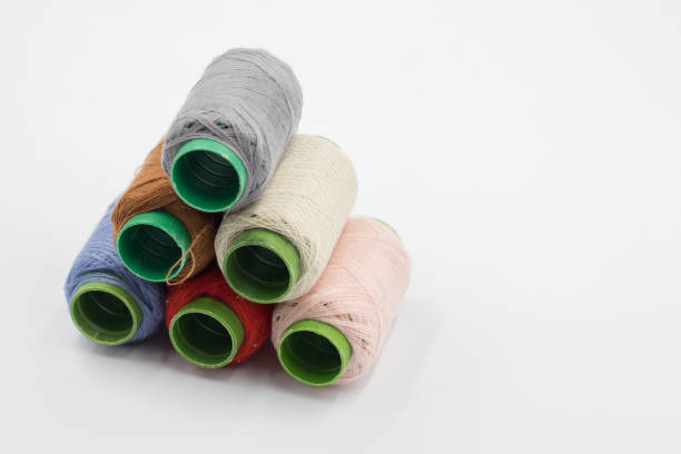 istock Colorful Spool of sewing thread, spool of industrial threads, Colored spools of thread on a white background. 2164784483