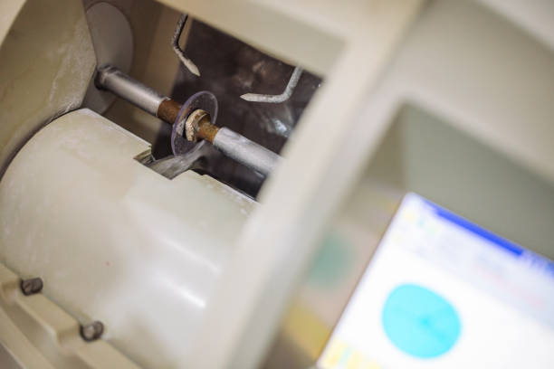istock Detailed side view of optical machine components in operation mode 2164786271