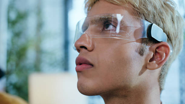 istock Man wearing smart glasses 2164787388