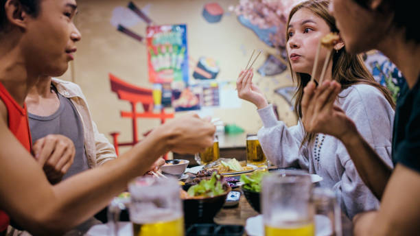 istock Happy  young Group eating in the restaurant. 2164787397