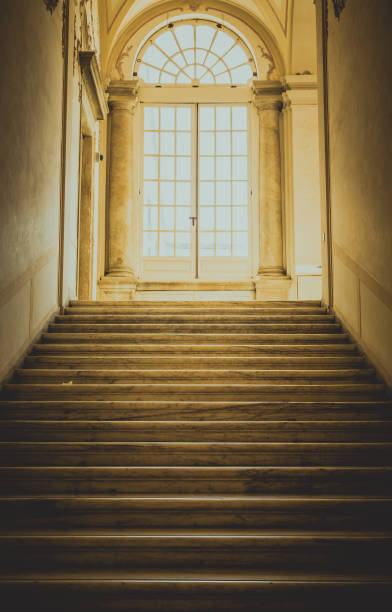 istock Ancient dark staircase - Grunge interior, nobody, empty building architecture, window. 2164789145