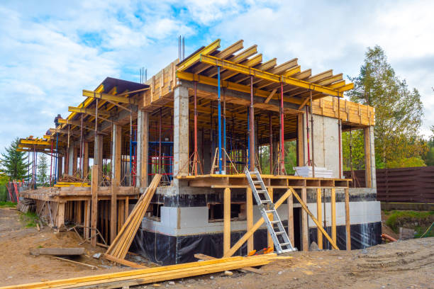 istock House under construction. Formwork for pouring concrete. Construction of the cottage. Construction of the building. Engineering work. 2164790579