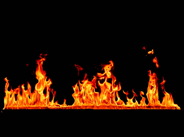 istock orange red fire line on black background 2164791838