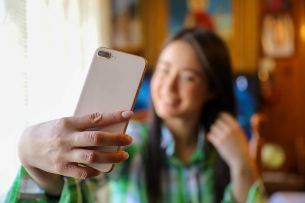 istock Girl with a Smartphone 2164792099