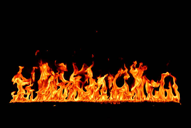 istock orange red fire line on black background 2164793164