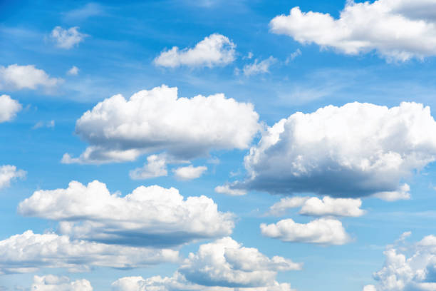 istock Many small fluffy clouds high up in the sky 2164797702