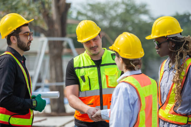 istock Engineering and foreman shaking hands on construction site and Agree. partnership and connection. Architect building supervising and inspector deal successful. 2164807396