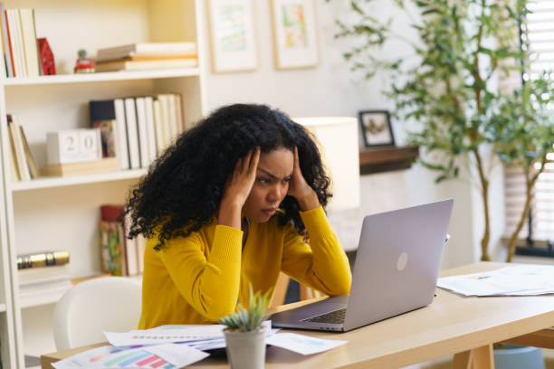 istock A woman has stress and a headache. Mental health problems from overwork Social problems, depression concept. 2164817613