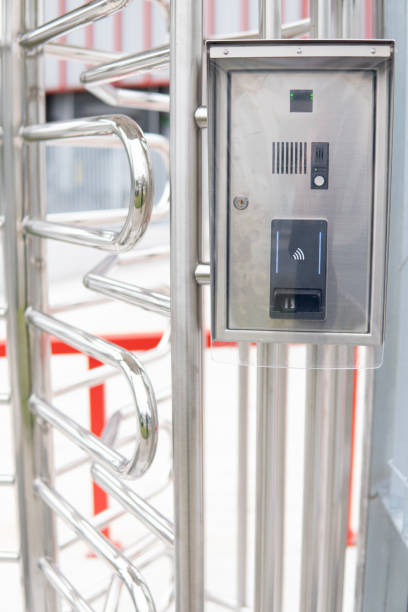 istock Modern keyless access lock with fingerprint and contactless on vertical security revolving door. biometric data entry. Concept: access control for industrial and office workers. 2164822080