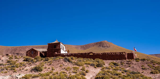 istock White historic church under a clear blue sky in Atacama, Chile 2164822620