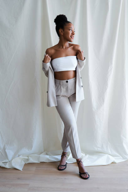 istock Confident young black woman entrepreneur posing in minimalist studio 2164824863