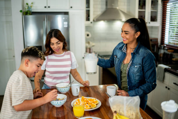 istock Family talking during breakfast at home 2164825221