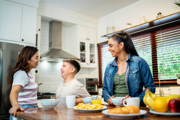 istock Family talking during breakfast at home 2164825230