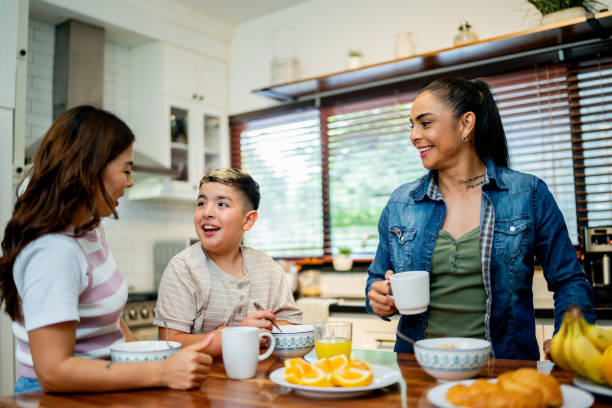 istock Family talking during breakfast at home 2164825232