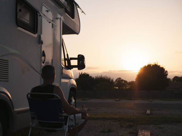 istock Sitting outside the motor home watching the sunset 2164825316