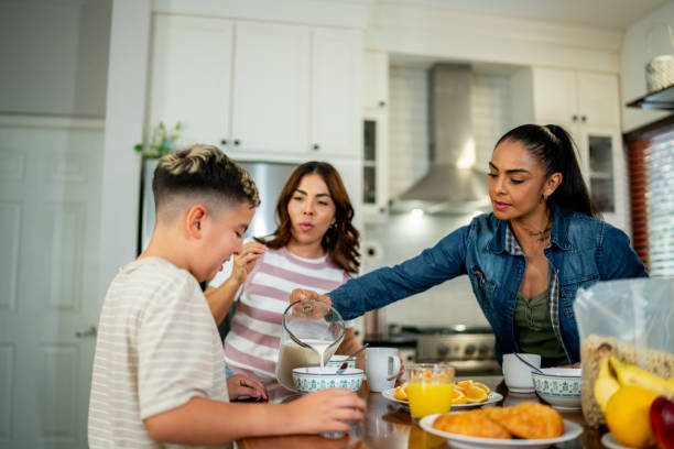 istock Family talking during breakfast at home 2164826315