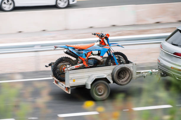 Motorbike, jump and man in the air with blue sky, mock up and stunt in sports with fearless person in danger with freedom. Motorcycle, jumping and athlete training for challenge or competition