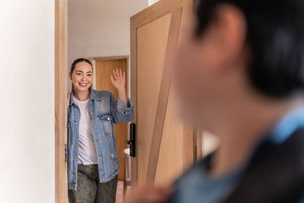 istock Mother saying goodbye to schoolboy son 2164827017