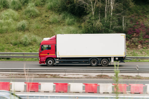 A truck in motion on a highway