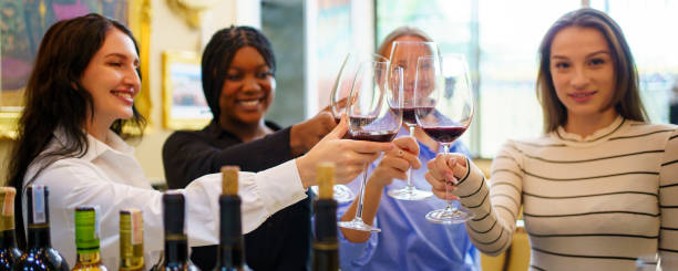 istock Diverse people are testing wine and talking together in the restaurant. 2164828231