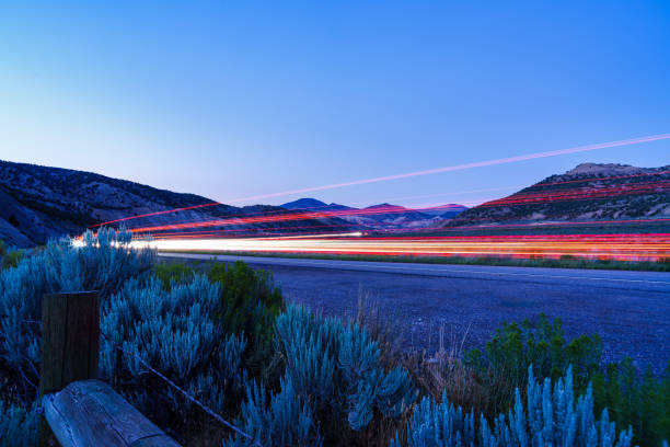 istock Light Trails Along Road at Dusk 2164832450
