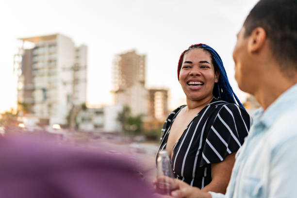 istock Friends talking at rooftop party 2164832842