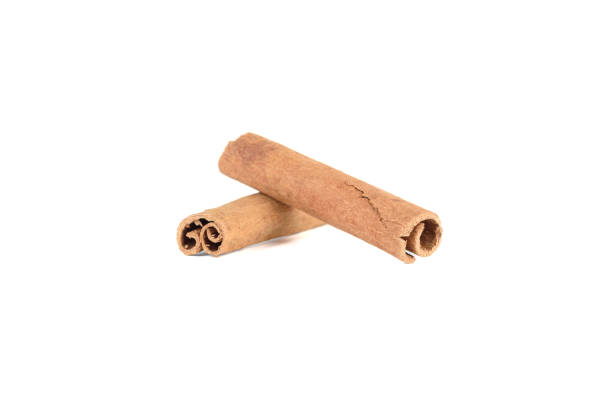 istock Two aromatic sticks of cassia spice on white background. 2164833239