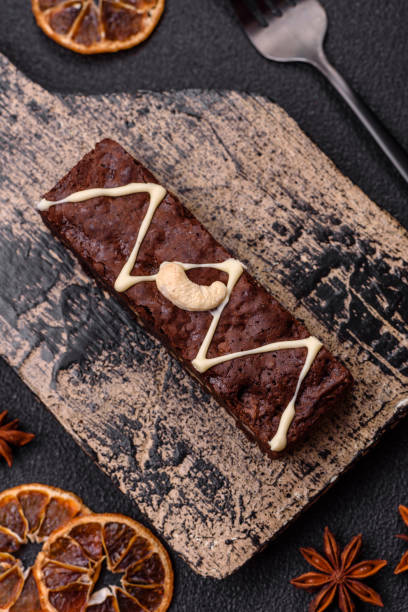 istock Delicious sweet brownies with chocolate and nuts 2164840367