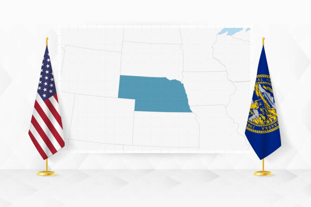 istock Map of Nebraska and flags of Nebraska on flag stand. 2164841717