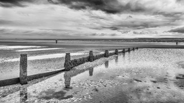 istock West Wittering Beach Groynes Black and White 2164842677
