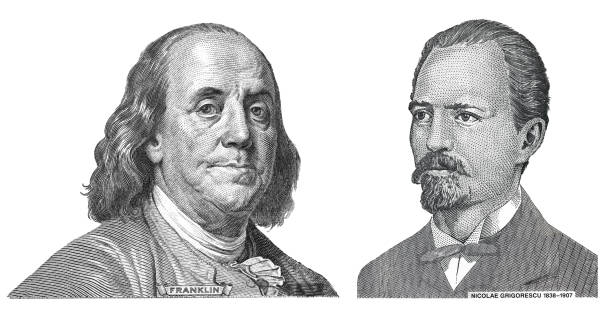 istock Benjamin Franklin cut from 100 US dollar banknote and Nicolae Grigorescu cut out from 10 Romanian Lei banknote 2164851739