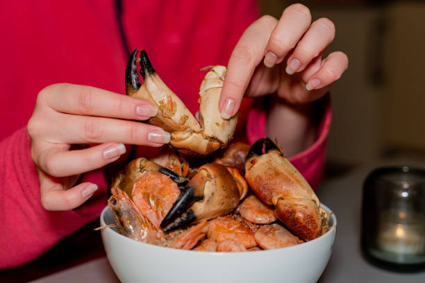 Close-up photo of a crab claw of a steamed crab.