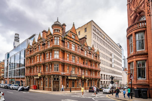 Birmingham, UK. 24 July 2024. Shoppers and Cornwall Street and Newhall Street architecture in Birmingham.