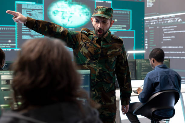 istock Military IT experts working on cyber security in a high tech government office 2164862291