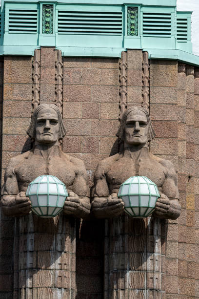 istock Statues on Helsinki Central Train Station 2164862411