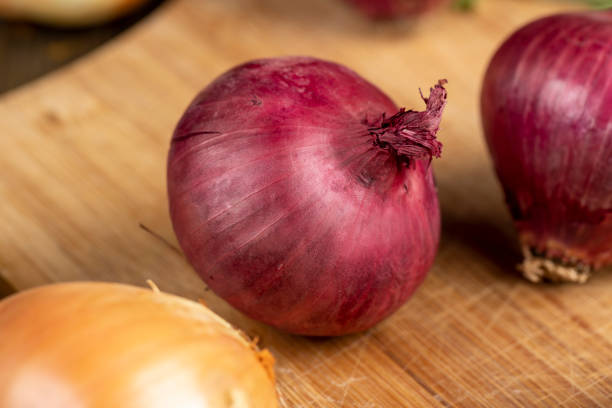 istock close-up of red onions in the kitchen 2164862480