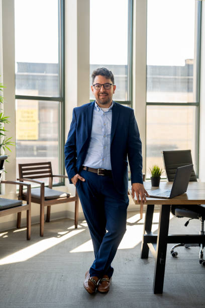 istock Mexican man working in a modern office 2164866250