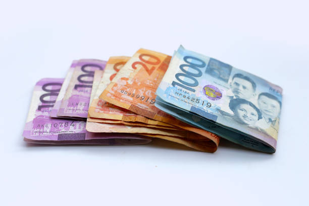 istock Philippine money, Banknotes on white background. 2164870080