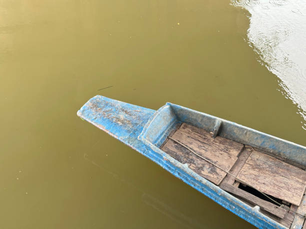 istock wooden boat on the river 2164871758