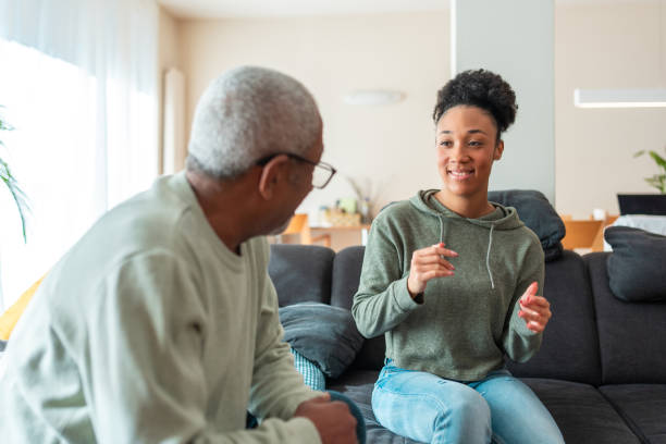 istock Diverse Family Having Conversation at Home 2164872742
