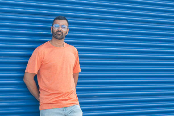 istock Man Asian Middle Eastern Stylish Orange Blue 2164878393