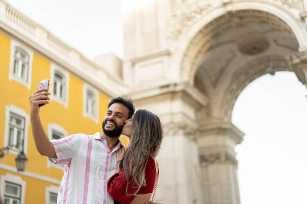 istock Couple taking selfie at the Arc de Triomphe 2164885341