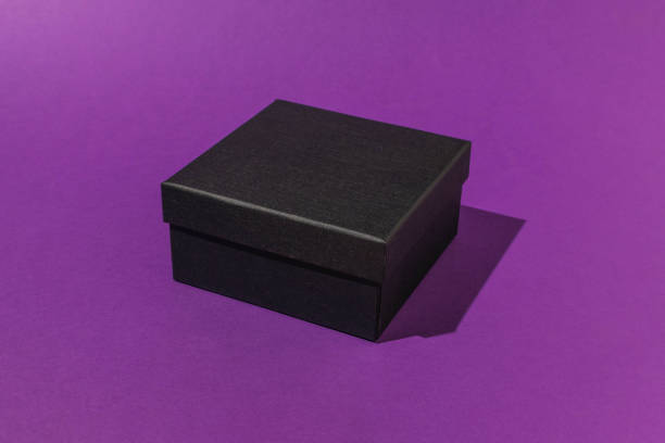 istock Black Gift Box on Purple Background - Minimalist Design for Celebrations and Events 2164885591