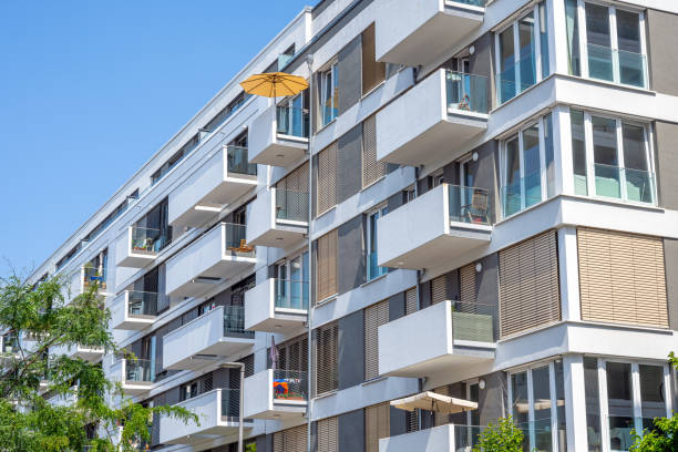 istock Modern multi-family apartment building 2164889019