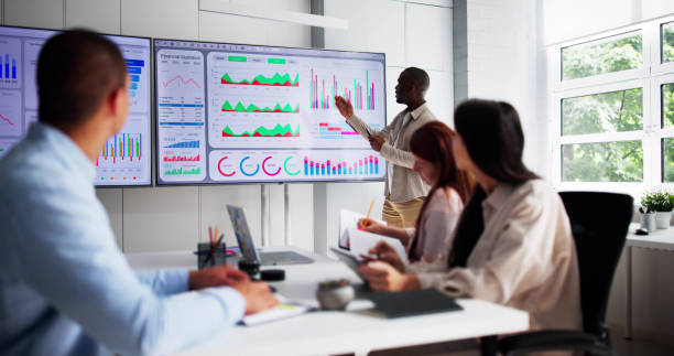 istock Business Presentation In Meeting Room. People Looking 2164892084