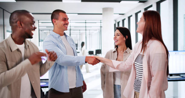 istock Business Recruiting And Consulting Handshake. Diverse Group 2164892151
