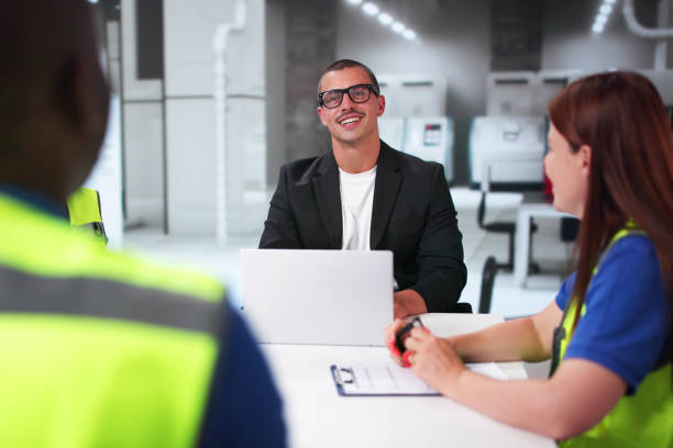 istock Businessman And Workers At Factory Line 2164892209